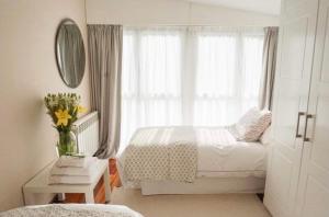Ένα ή περισσότερα κρεβάτια σε δωμάτιο στο Graña Beach Ferrol