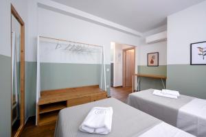 Кровать или кровати в номере AG Luxury Villas, Iraklitsa