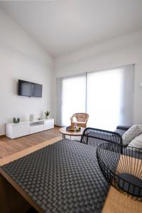 Телевизор и/или развлекательный центр в AG Luxury Villas, Iraklitsa