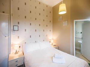 Cama ou camas em um quarto em Cornerways