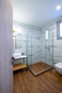 Ванная комната в AG Luxury Villas, Iraklitsa