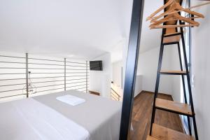 Кровать или кровати в номере AG Luxury Villas, Iraklitsa