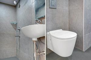a bathroom with a toilet and a sink at HOTEL V in Hyderabad