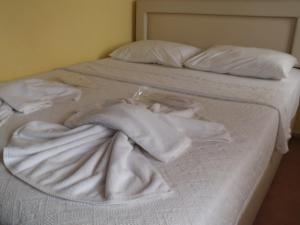 Cama o camas de una habitación en Villa d'Or Hotel