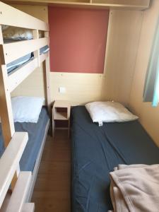 Postel nebo postele na pokoji v ubytování Le Phare d'Opale III, A20