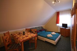 Posteľ alebo postele v izbe v ubytovaní Mandula Wellness Apartmanház
