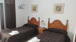 Cama o camas de una habitación en Hostal Efebo 24H