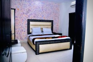 Ένα ή περισσότερα κρεβάτια σε δωμάτιο στο Hotel Tulip Inn