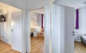 Łóżko lub łóżka w pokoju w obiekcie Apartment Lannach