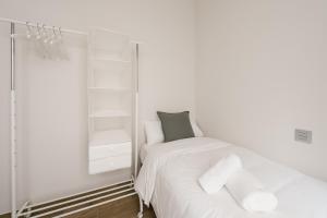 Cama o camas de una habitación en T1, Tirso de Molina, apartamento luminoso y tranquilo