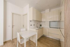 Una cocina o zona de cocina en T1, Tirso de Molina, apartamento luminoso y tranquilo