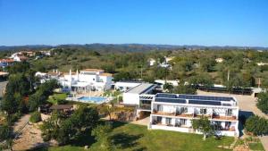 an aerial view of a large house with a yard at Casa Branca Turismo Rural in Tavira