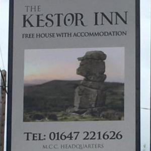 a sign for the visitor inn with a picture of a house at Kestor Inn, Manaton, Dartmoor National Park, Newton Abbot, Devon in Manaton