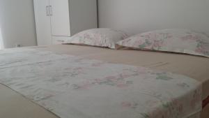 Postel nebo postele na pokoji v ubytování Apartments Oliva