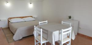 Postel nebo postele na pokoji v ubytování Apartments Oliva