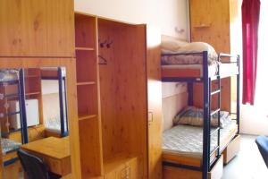 Postel nebo postele na pokoji v ubytování Pannonia Hostel