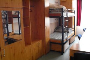 Postel nebo postele na pokoji v ubytování Pannonia Hostel + 21 fotografií