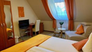 Ліжко або ліжка в номері Gösser BACHGASSLHOF -- Bed and Breakfast -- Apartments