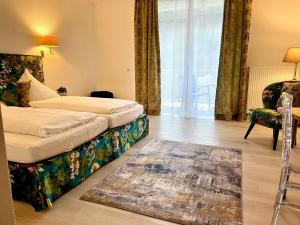Postel nebo postele na pokoji v ubytování Hotel zum Engel