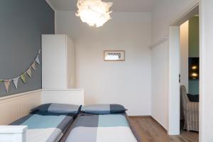 Postel nebo postele na pokoji v ubytování Harzquartier