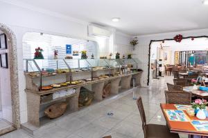 En restaurang eller annat matställe på Hotel Nacional Inn Guarujá