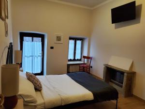 Katil atau katil-katil dalam bilik di B&B L'orto del Geo