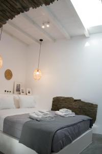 En eller flere senge i et værelse på Casa Di Volto