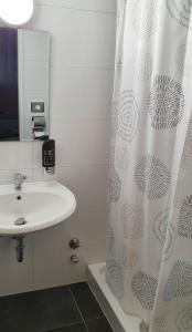 Ванна кімната в Hotel Berkut