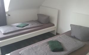 Un pat sau paturi într-o cameră la Hotel Berkut