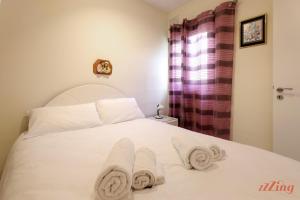 Krevet ili kreveti u jedinici u okviru objekta Seaside Apt with Side Sea Views - New