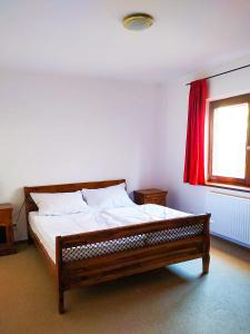 Postel nebo postele na pokoji v ubytování Ubytování U Žižků