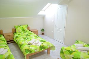 Postel nebo postele na pokoji v ubytování Guest House Konak Iris