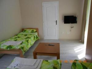 Postel nebo postele na pokoji v ubytování Guest House Konak Iris
