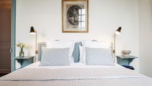 En eller flere senge i et værelse på Le Domaine de Courances - Pierres d'Histoire