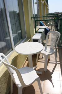 A balcony or terrace at Sunny Varshava Hotel