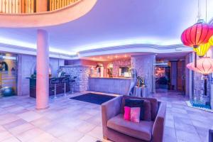 A seating area at Lago Garden Apart-Suites & Spa Hotel
