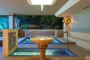 A seating area at Lago Garden Apart-Suites & Spa Hotel