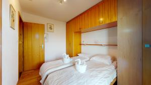 Voodi või voodid majutusasutuse Greppons O 020 - MOUNTAIN apartment 5 pers toas
