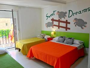 Cama o camas de una habitación en Sweet Home Salamanca