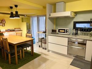 Kuchyň nebo kuchyňský kout v ubytování 極簡旅行民宿 Simple Travel B&B