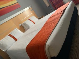 Postel nebo postele na pokoji v ubytování Bes Hotel Bergamo Ovest