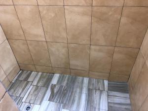 an overhead view of a tiled ceiling with a floor at Cool Running Apartments in Saint Georgeʼs