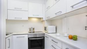 Kuchyň nebo kuchyňský kout v ubytování 1Solive - Calella de Palafrugell