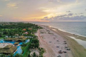an aerial view of the beach at a resort at Bangalô Eco Residence Flecheiras in Flecheiras