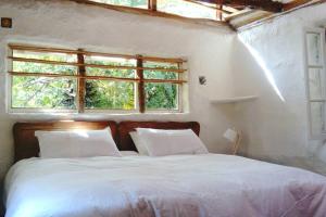 Cama o camas de una habitación en Cabaña al alba