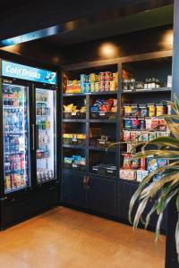 a grocery store with shelves full of food at Waypoint Hotel in Bend
