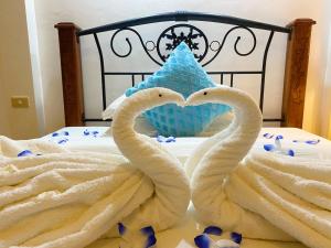 Voodi või voodid majutusasutuse Azure Camotes Resort Hotel toas