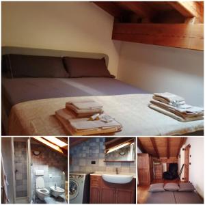 A bed or beds in a room at Mansarda Chanoux CIR n 0027