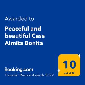 a yellow sign with the number on it at Peaceful and beautiful Casa Almita Bonita in Sámara