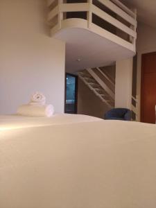 Postel nebo postele na pokoji v ubytování Hotel Olimpo